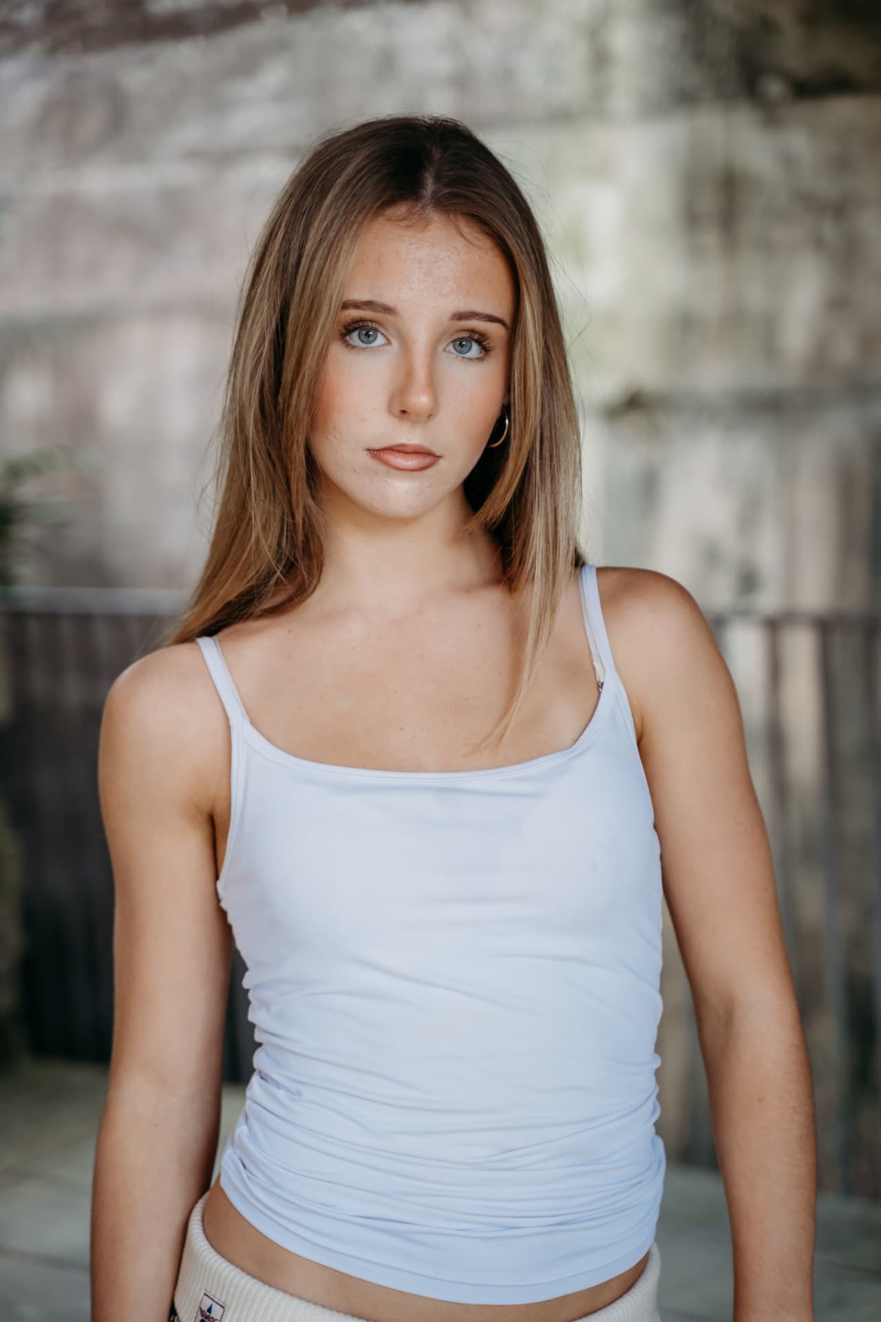Amahlia editorial — White tank · sunlit concrete